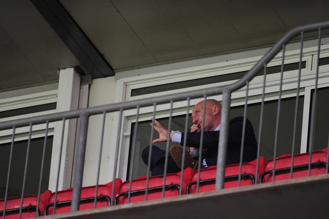 Ian Holloway watches from the stands