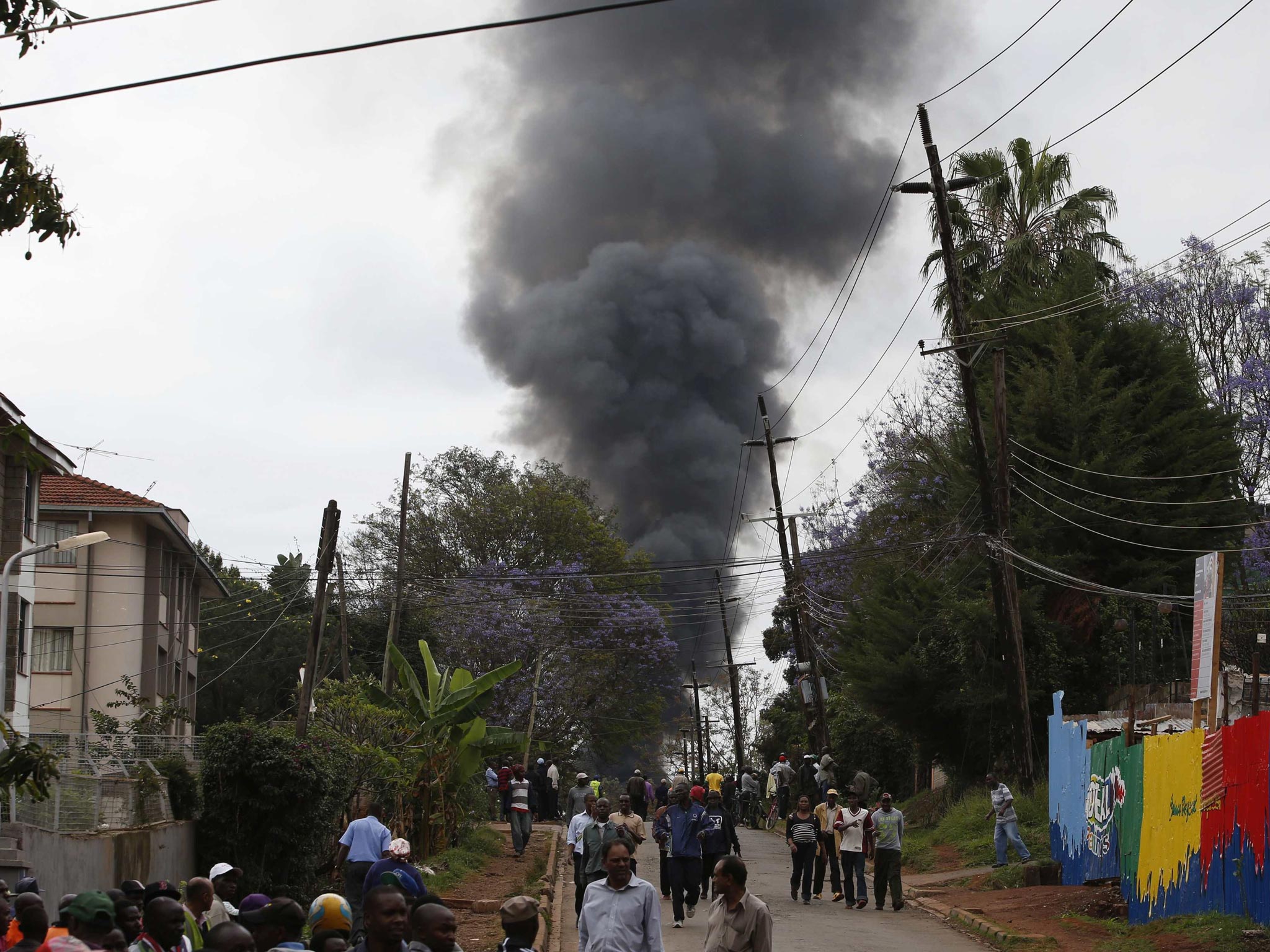 Smoke rises over Westgate Shopping Centre after an explosion in Nairobi