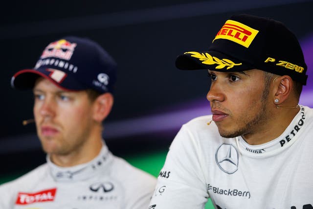 Sebastian Vettel and Lewis Hamilton in a press conference