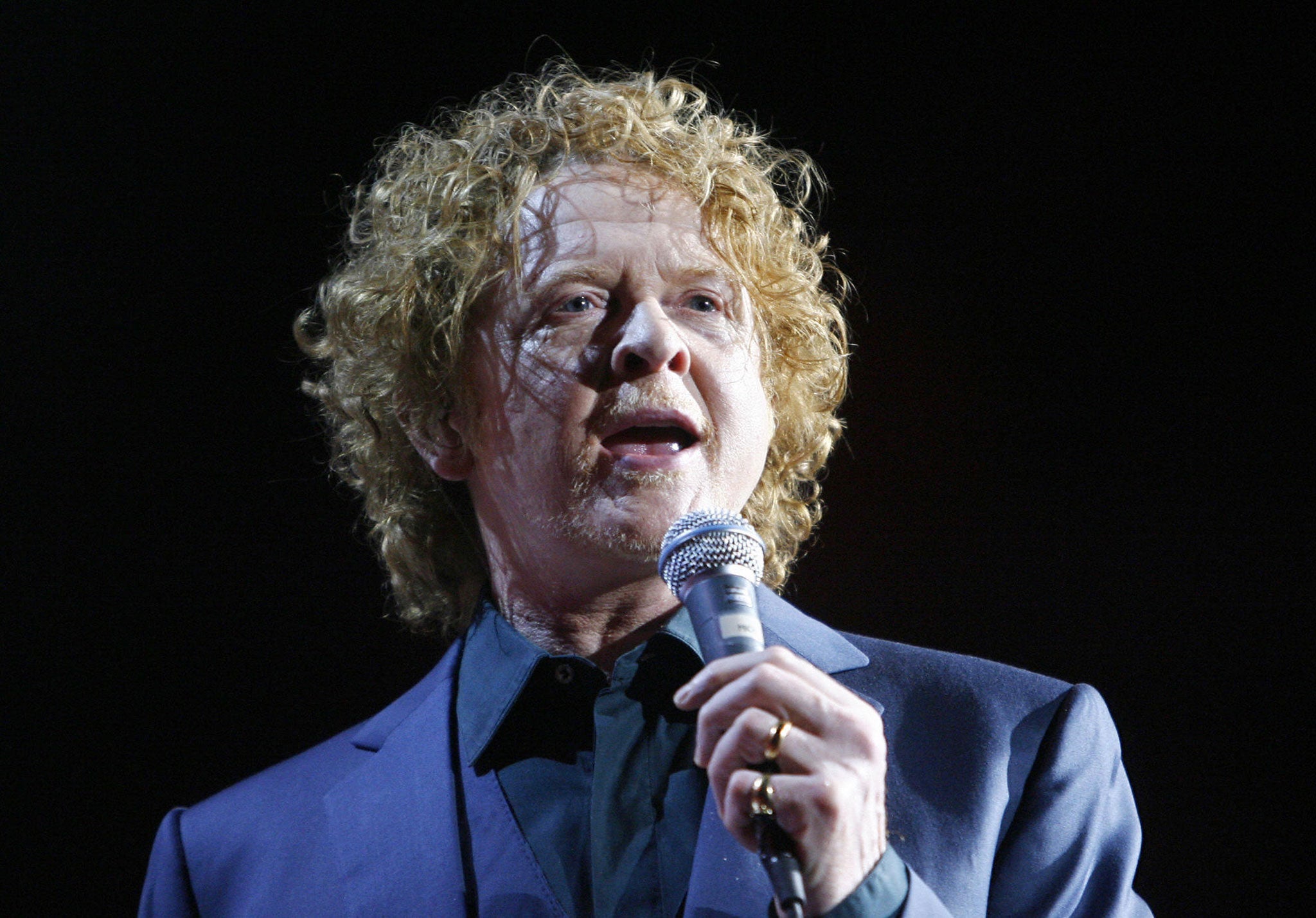 Songs by Mick Hucknall's Simply Red keep people on the phone