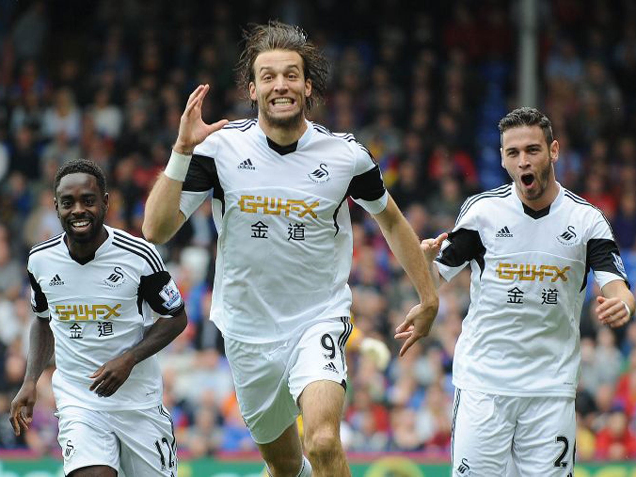 Michu will be in action for Swansea against Arsenal