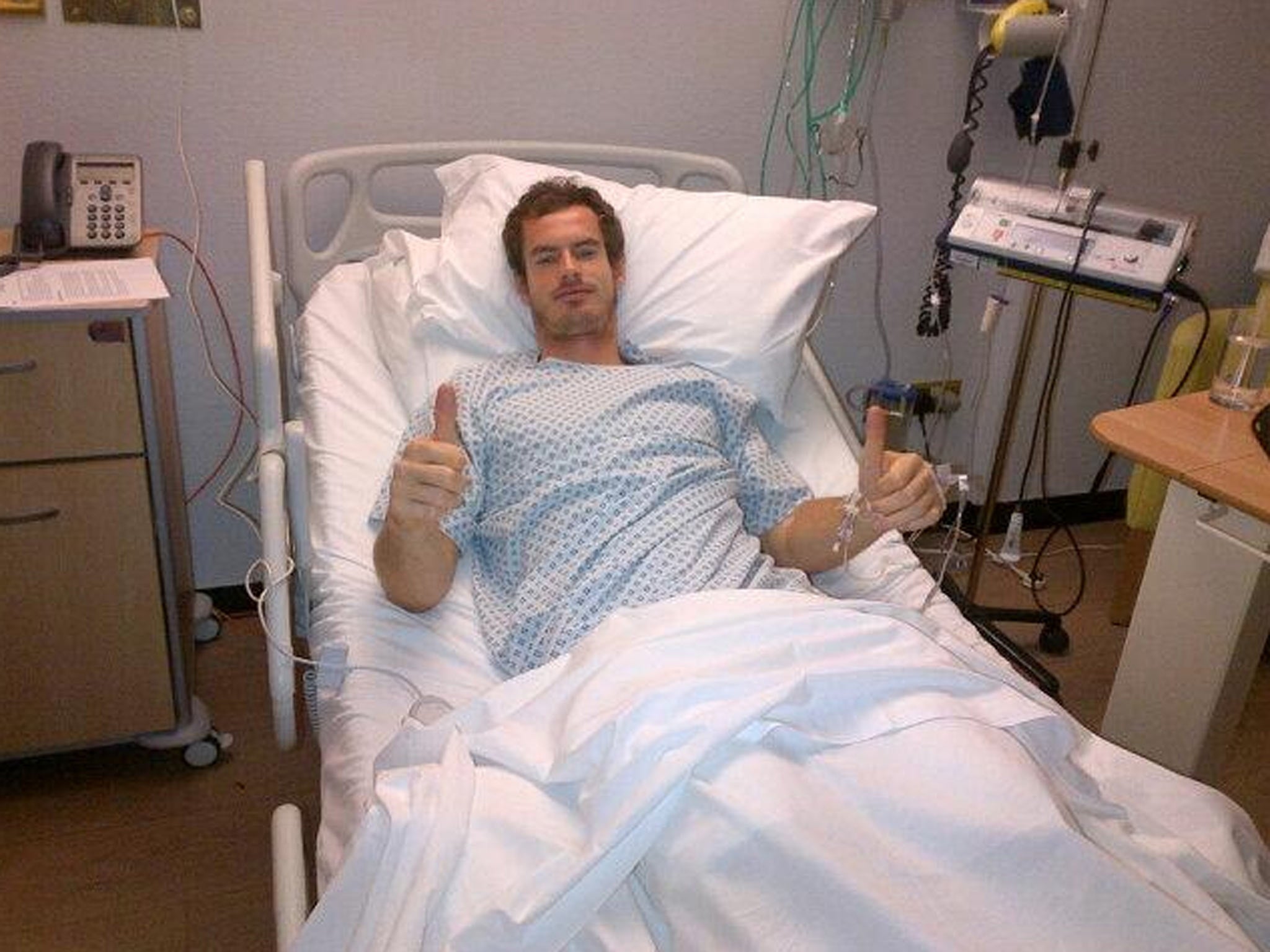 Andy Murray gives the thumbs up from hospital