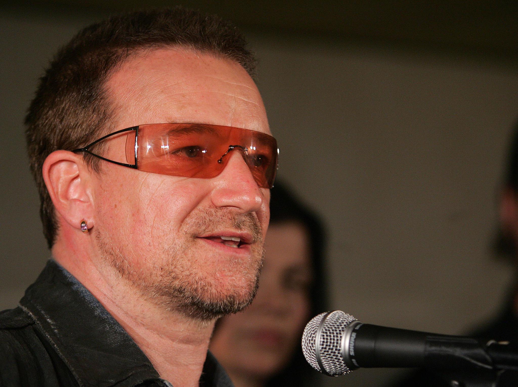 Why does bono store always wear sunglasses