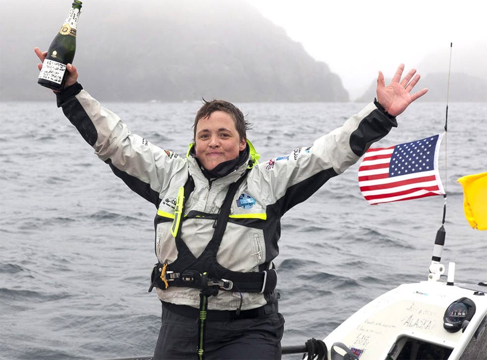 Sarah Outen celebrating her arrival at Adak, Alaska