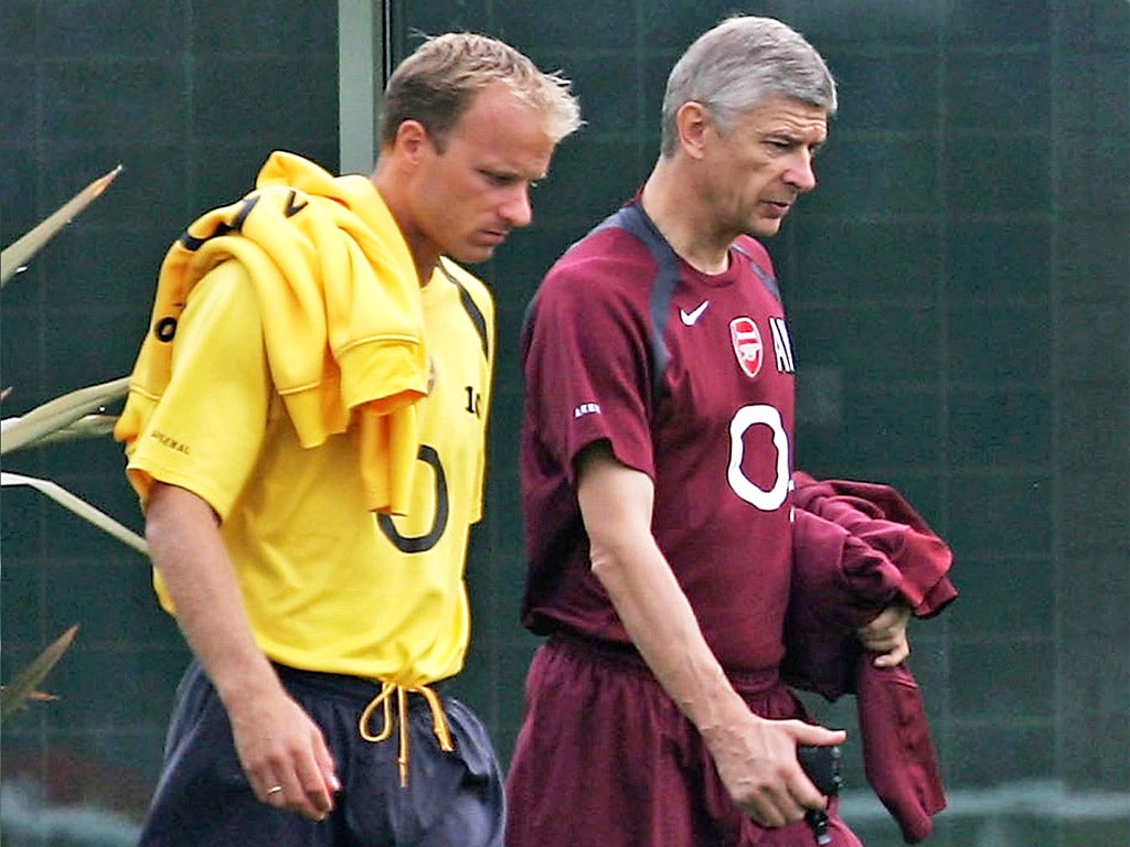 Dennis Bergkamp and Arsène Wenger in sombre mood together
