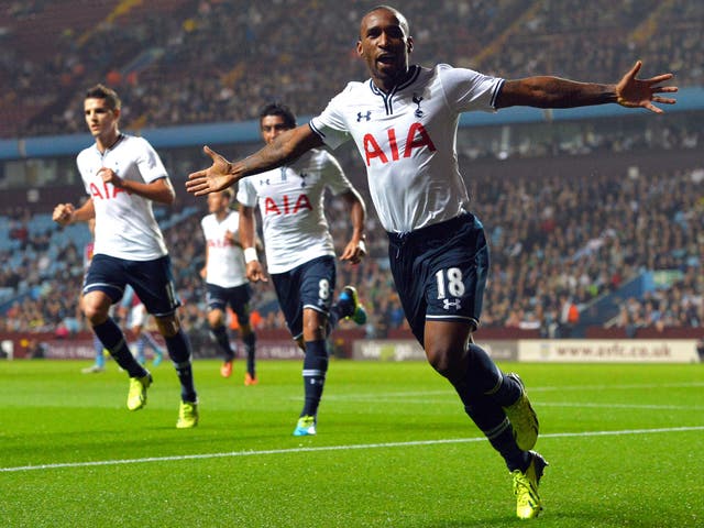 Tottenham Hotspur striker Jermain Defoe celebrates scoring the opening goal during the Capital One Cup  against Aston Villa