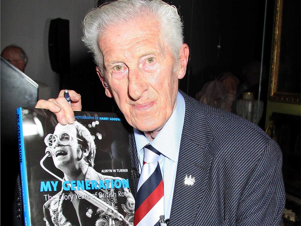 Harry Goodwin photographed in 2010, holding a book celebrating his life's work