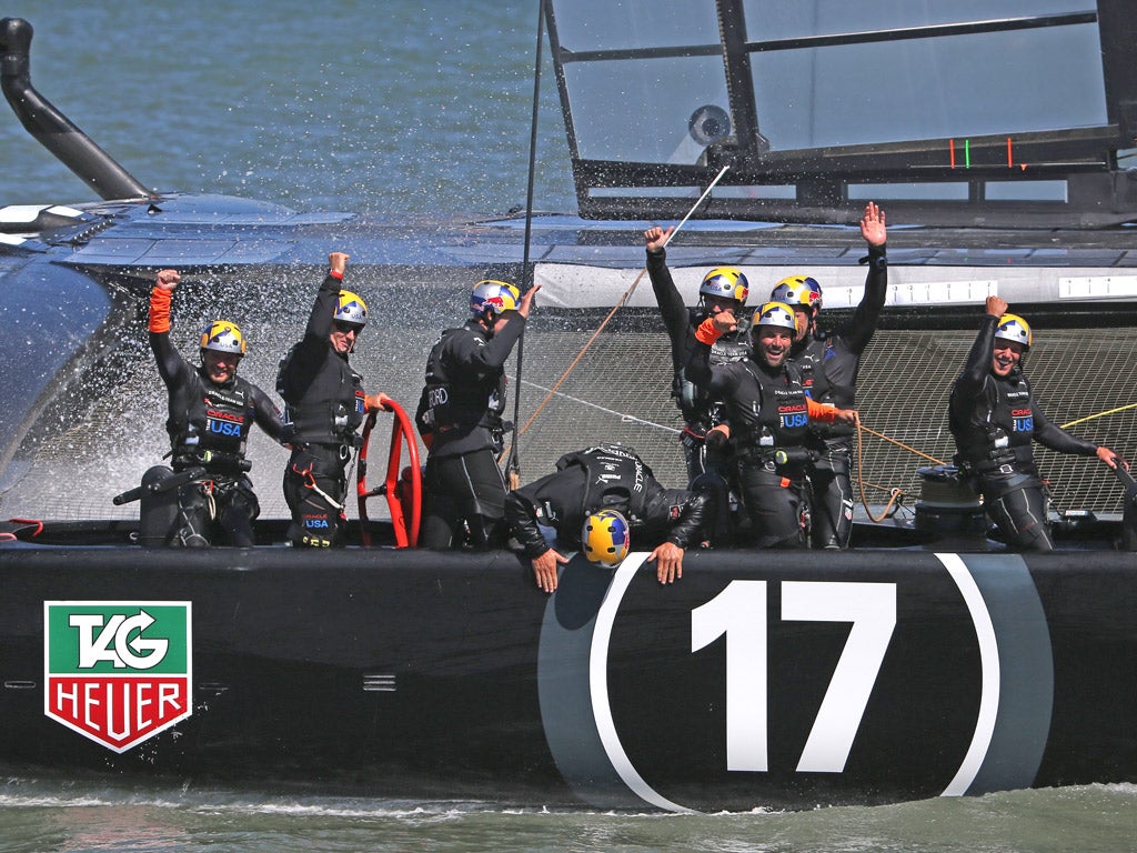 Oracle Team USA celebrate retaining the America's Cup