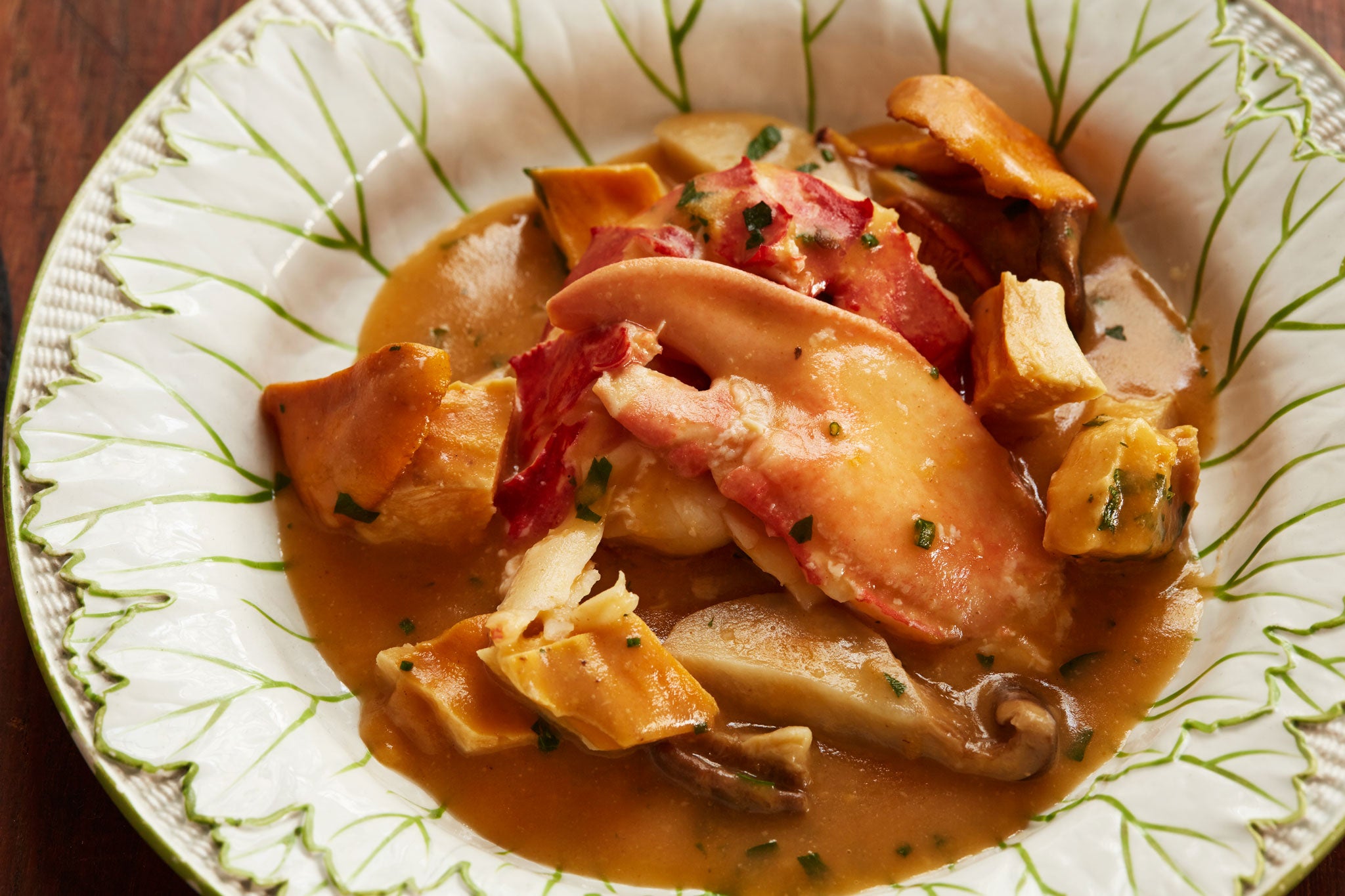 Use seasonal mushrooms or dried Chinese black fungus for colour in this lobster stew