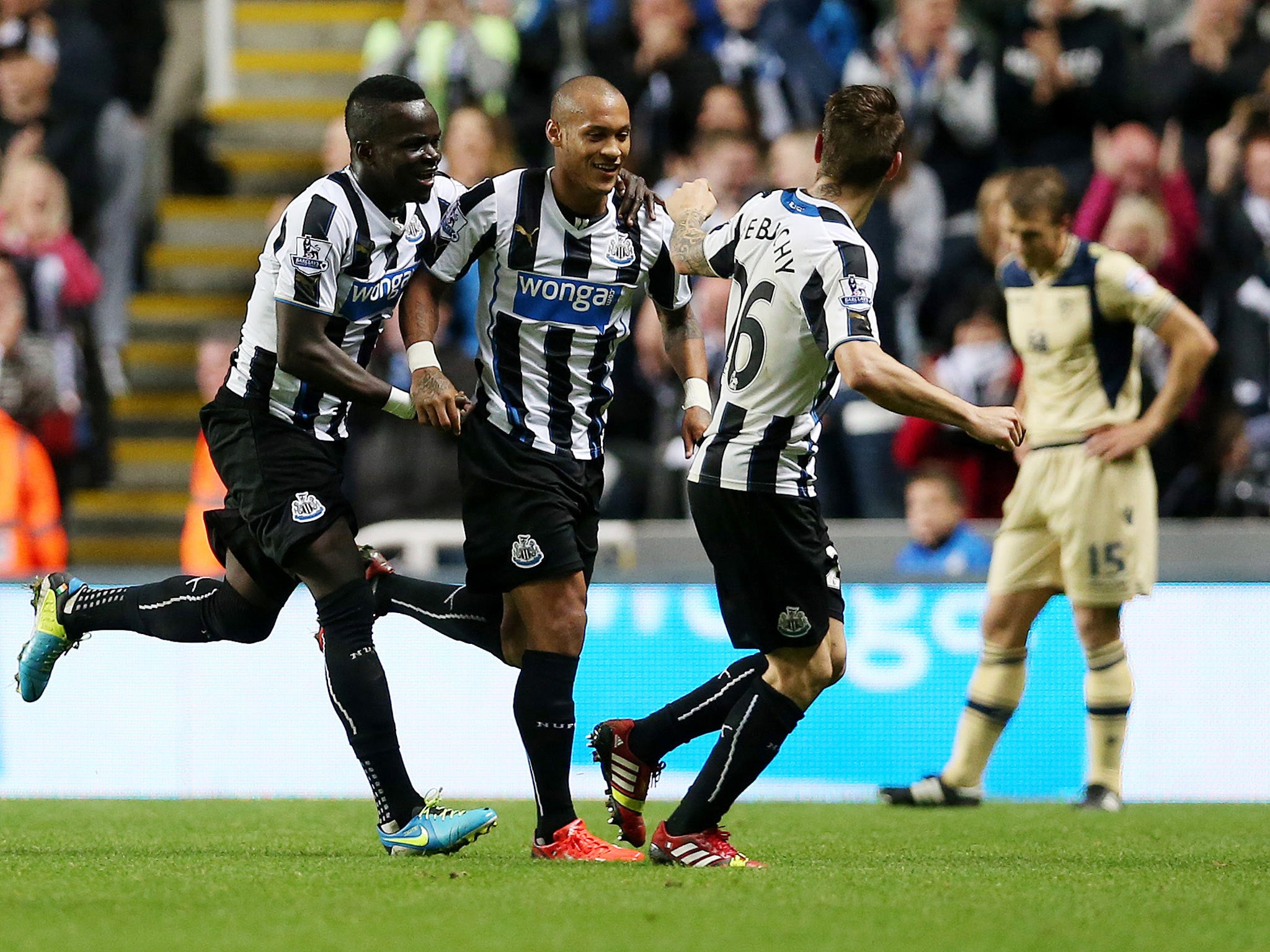 Newcastle United's French striker Yoan Gouffran (C) celebrates scoring a goal against Leeds