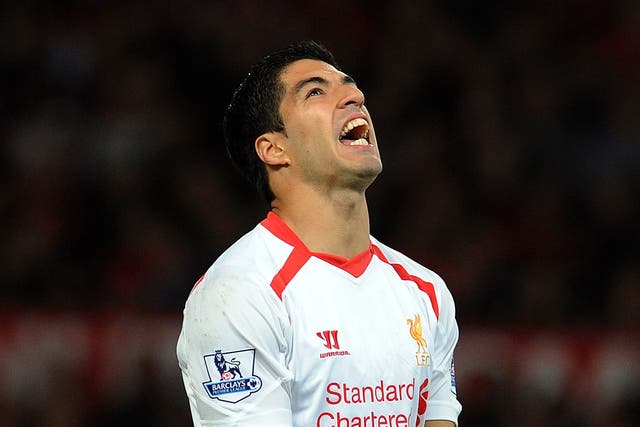 Luis Suarez looks on during his Liverpool return against Manchester United