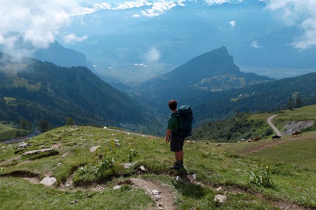 Long way down: a hiker en route to Ovronnaz