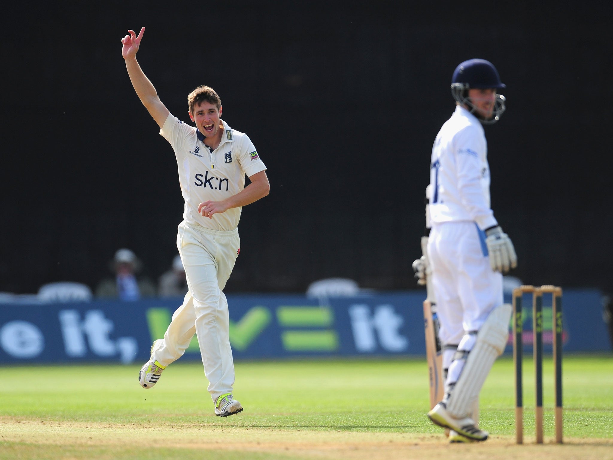 Warwickshire bowler Chris Woakes celebrates after dismissing Derbyshire batsman Paul Borrington