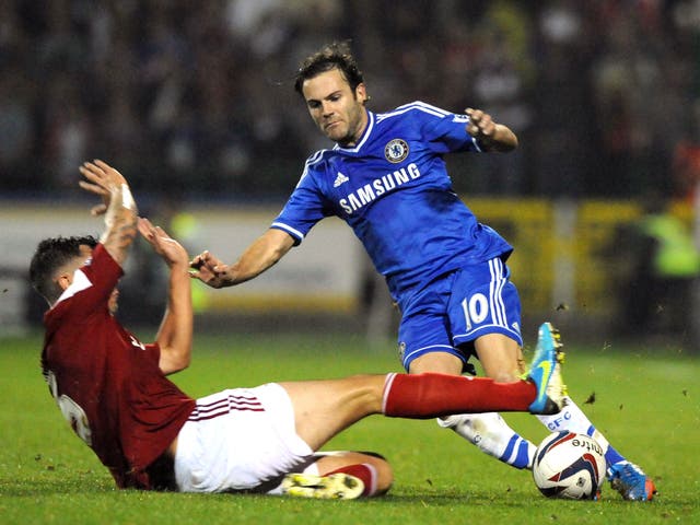 Juan Mata in action for Chelsea against Swindon Town in the Capital One Cup