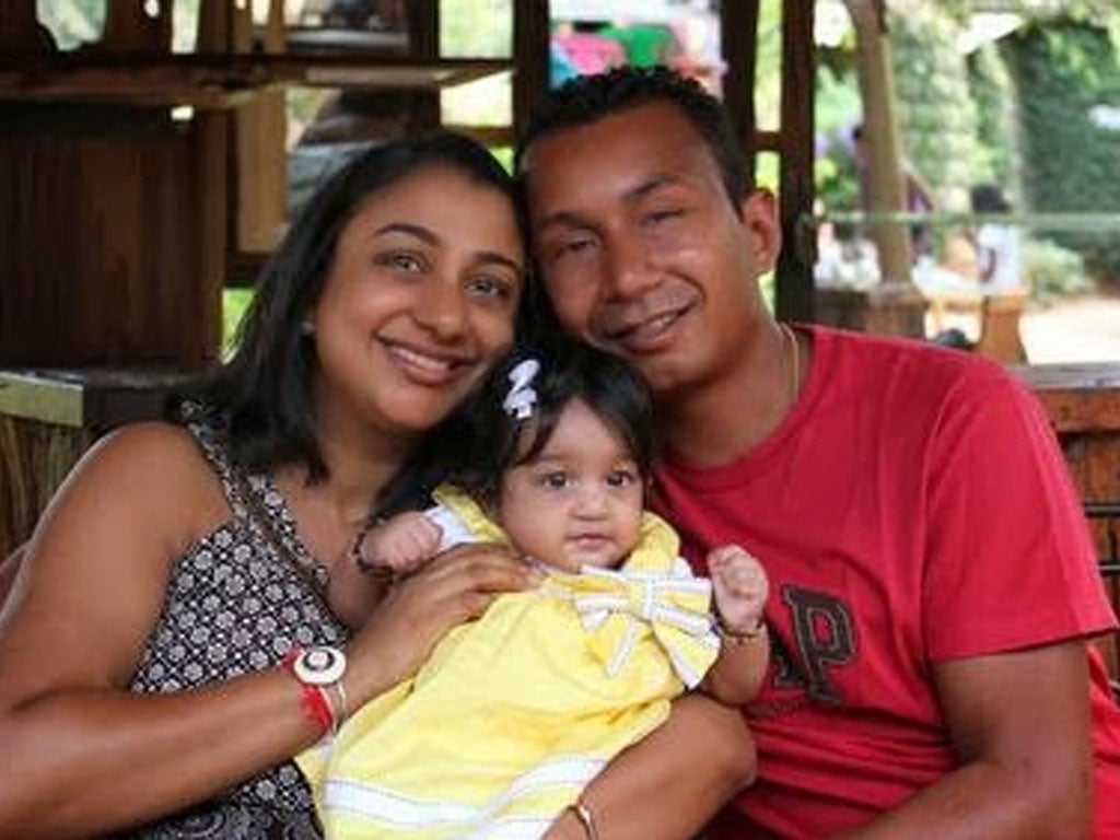 Mitul Shah with wife Rupal and daughter Sarai, aged two; while he was unable to convince gunmen to agree he gave victims time to flee