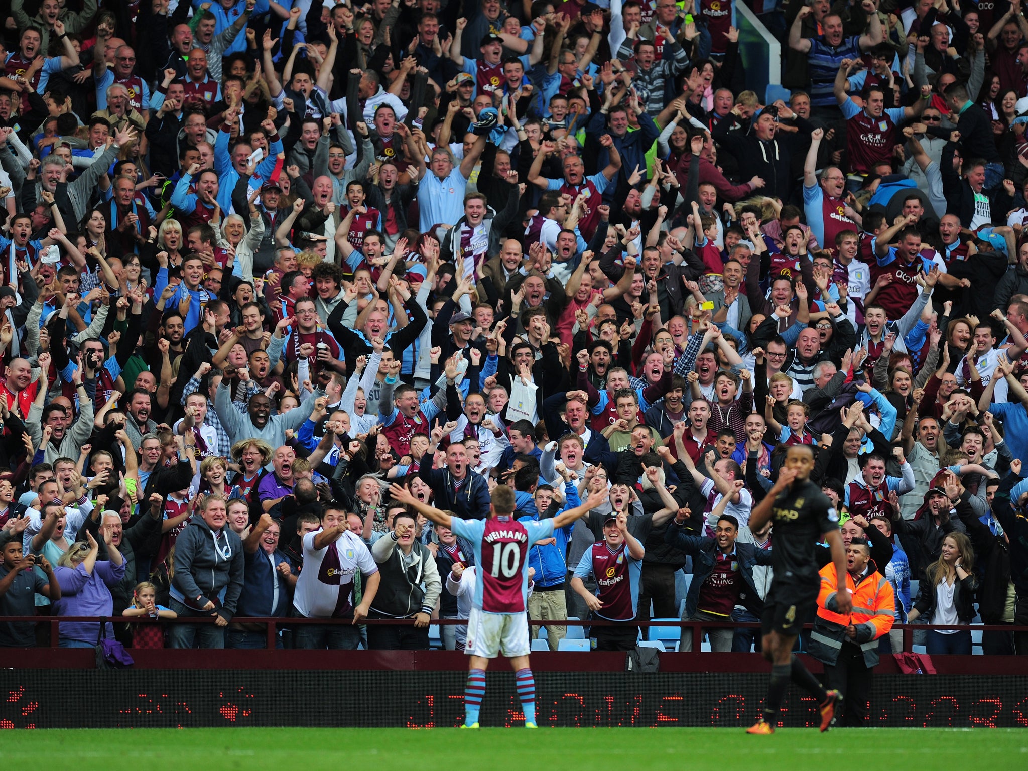 Andreas Weimann celebrates scoring the winner against Manchester City