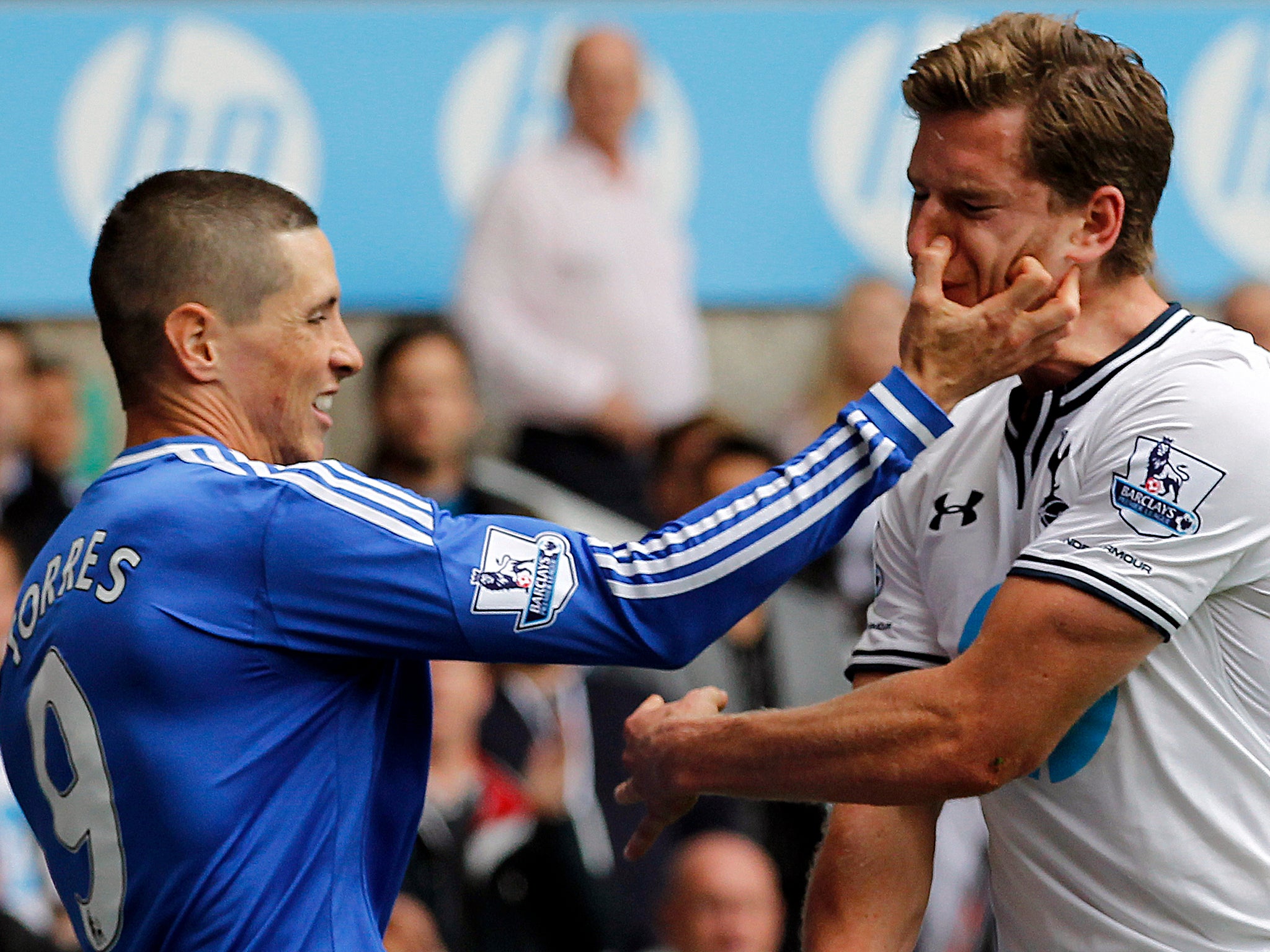 Chelsea's Fernando Torres clashes with Jan Vertonghen of Tottenham