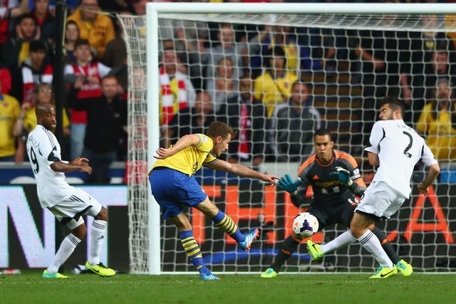 Aaron Ramsey scores for Arsenal against Swansea