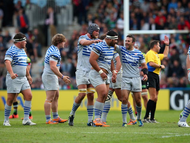 James Johnston of Saracens is congratulated by his team-mate Neil De Kock