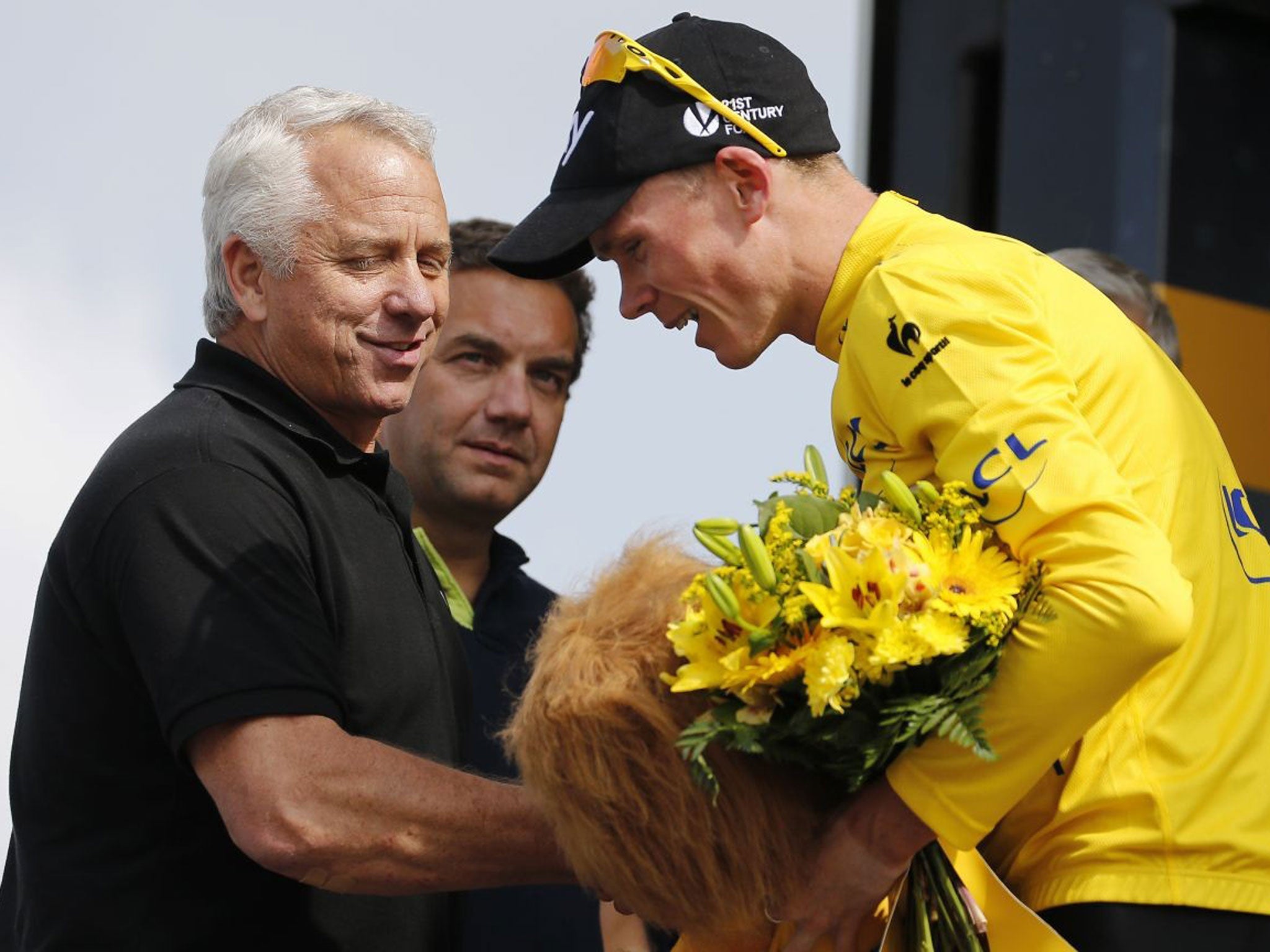 Yellow fellows: Former Tour hero Greg LeMond greets Chris Froome