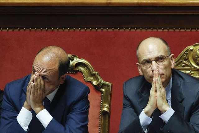 Italy's Prime Minister Enrico Letta (right) and Interior minister Angelino Alfano 