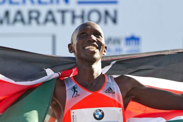 Wilson Kipsang celebrates his record-breaking victory in Berlin on Sunday