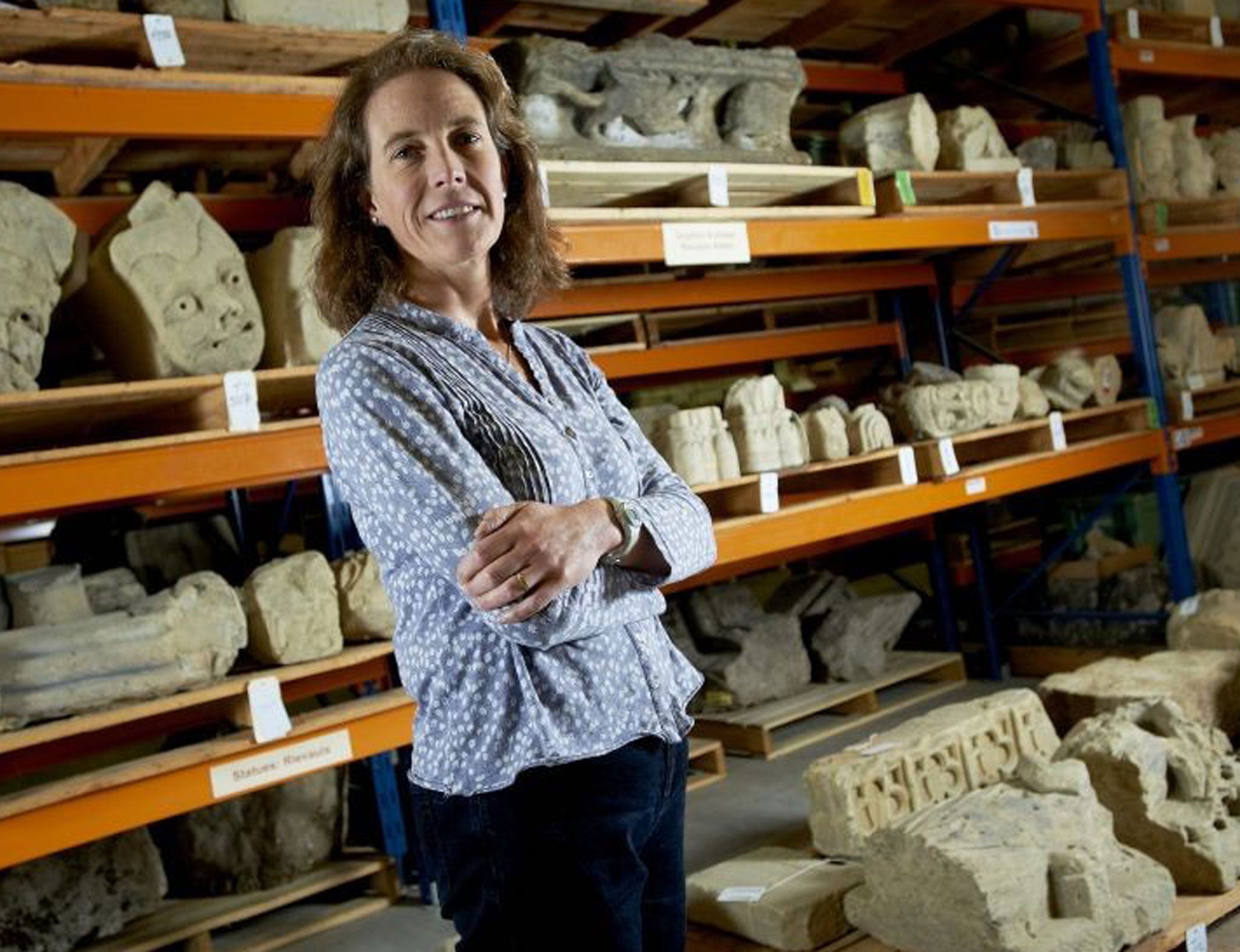 Broken art: curator Susan Harrison with smashed sculptures from Rievaulx Abbey in North Yorkshire