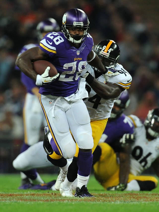 Adrian Peterson breaks away to score a touchdown at Wembley