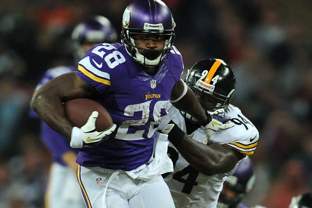 Adrian Peterson breaks away to score a touchdown at Wembley