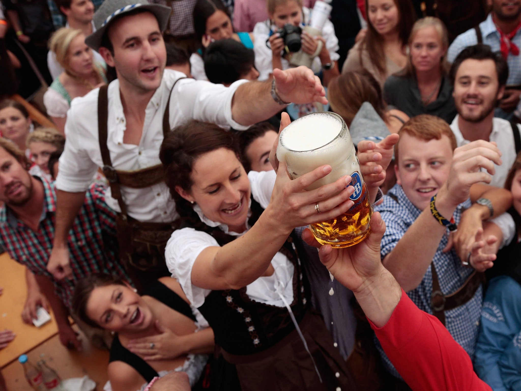Foreign revellers are encouraged to drink to excess at the Munich beer festival