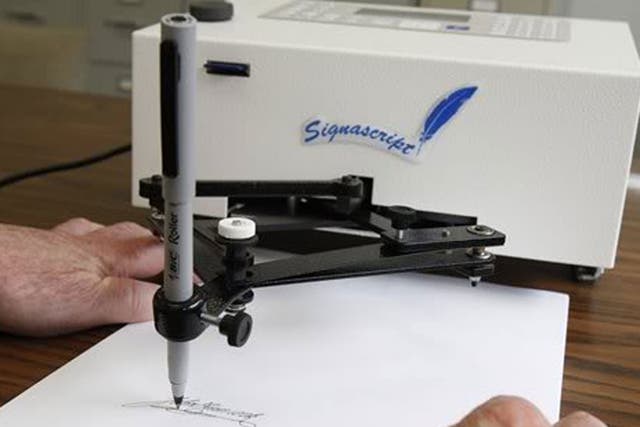 An mechanical signing machine (note: nothing to do with Apple)