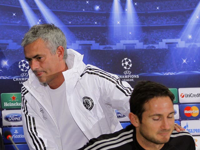 Jose Mourinho storms out of the Champions League press conference, leaving behind a bemused Frank Lampard 