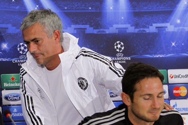 Jose Mourinho storms out of the Champions League press conference, leaving behind a bemused Frank Lampard 