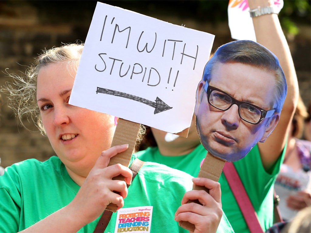 Members of NUT and NASUWT unions march through Cambridge