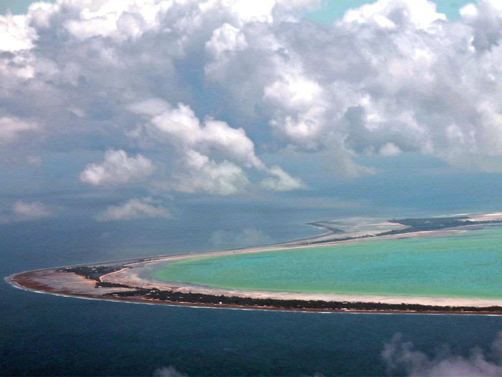 Kiribati, a low-lying island nation in the central Pacific, would disappear if sea levels rise by just one metre