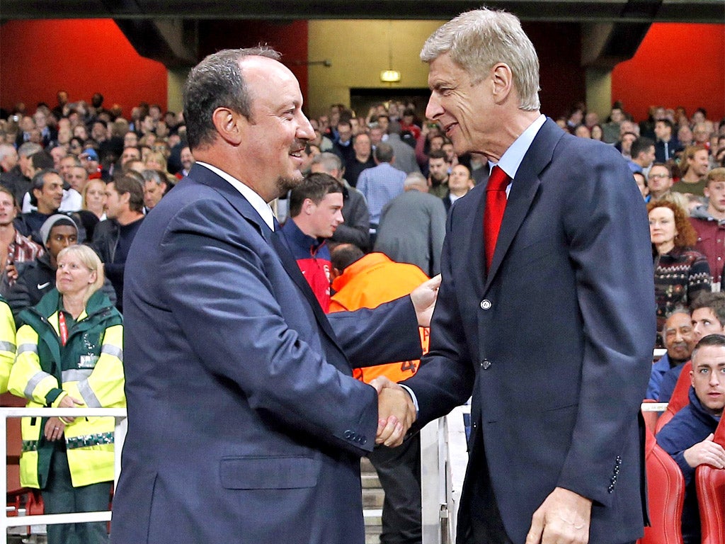 Rafael Benitez (left) shakes hands with Arsène Wenger