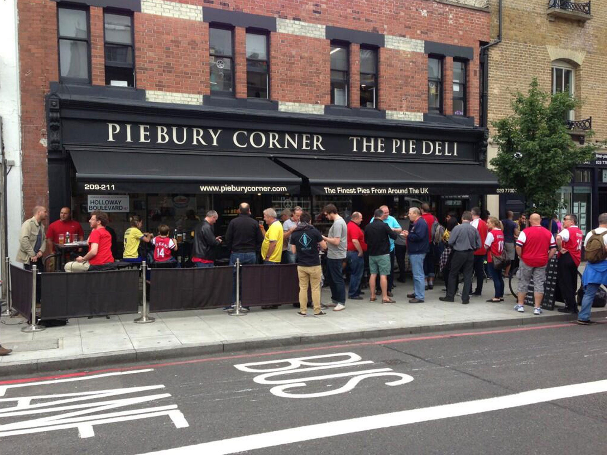Piebury Corner near the Emirates Stadium in north London, where a group of Napoli fans launched an 'unprovoked attack' before a Champions League match last night
