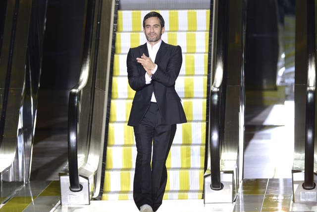 Marc Jacobs acknowledging the public at the end of his Spring/Summer 2013 ready-to-wear collection for Louis Vuitton in Paris