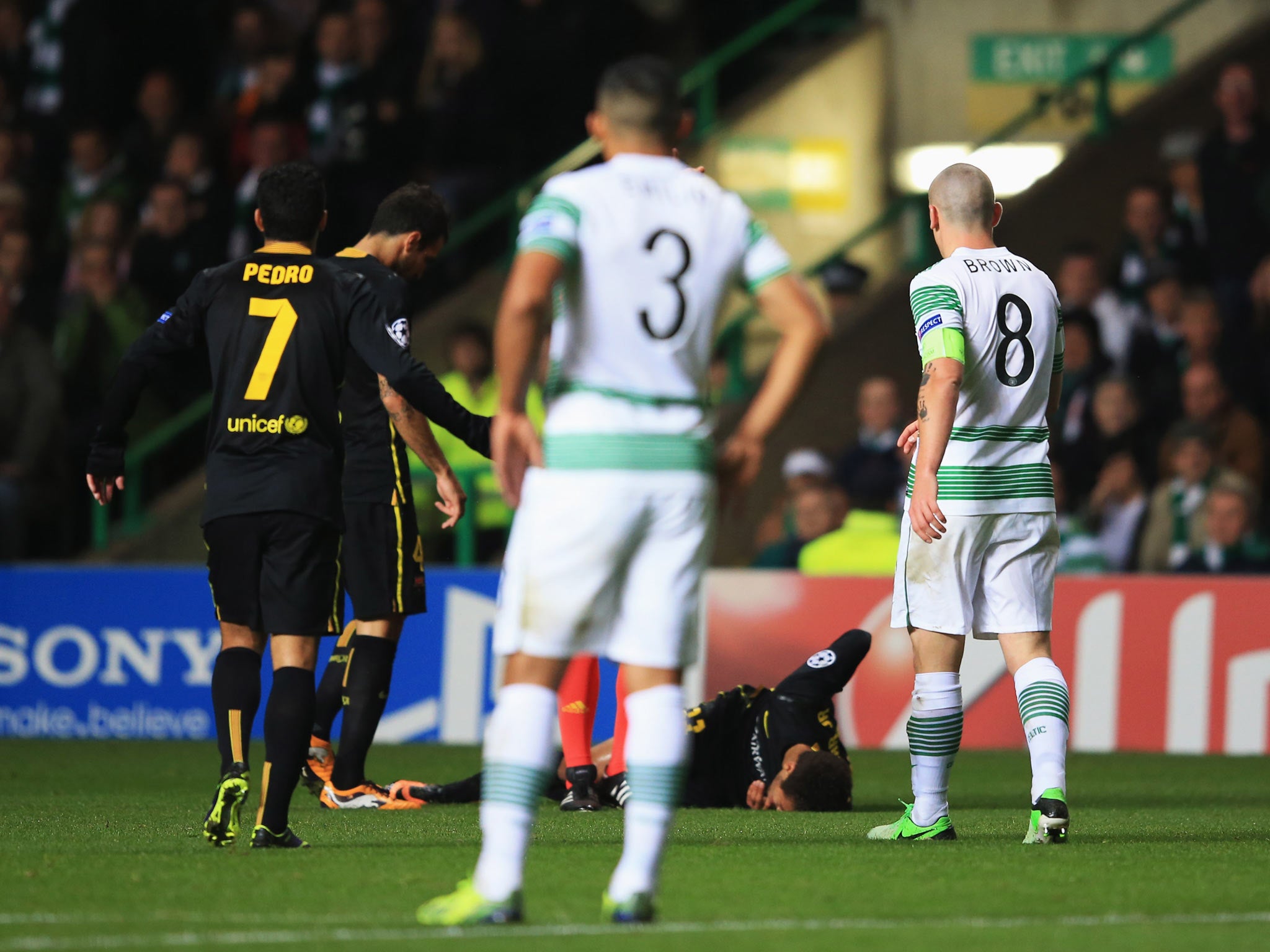 Neymar on the turf following the contact from Scott Brown