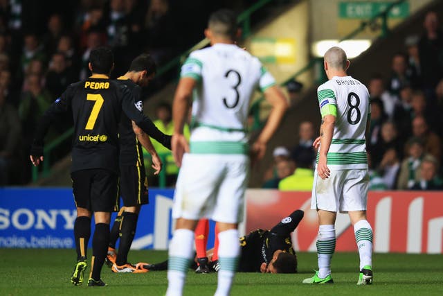Neymar on the turf following the contact from Scott Brown