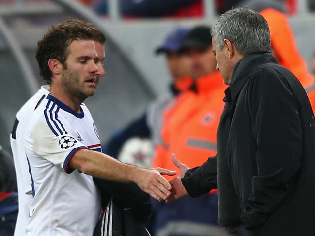 Juan Mata shakes the hand of Jose Mourinho after a fine performance in the Champions League
