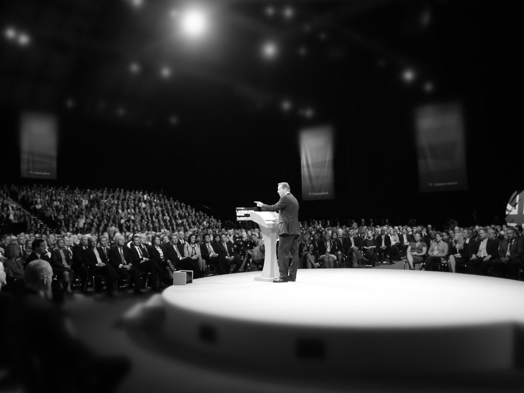 British Prime Minister David Cameron delivers his keynote speech to delegates on the last day of the annual Conservative Party Conference at Manchester Central on October 2, 2013 in Manchester, England. 