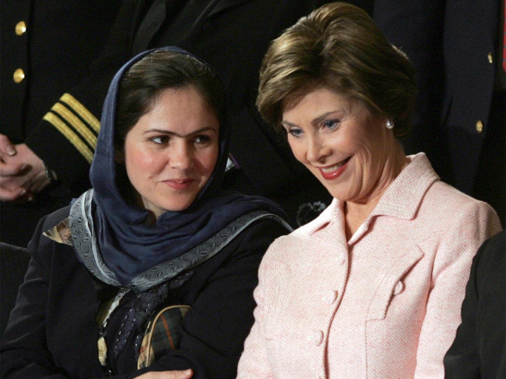 Fawzia Koofi with then US First Lady Laura Bush in Washington in 2006 (Getty)