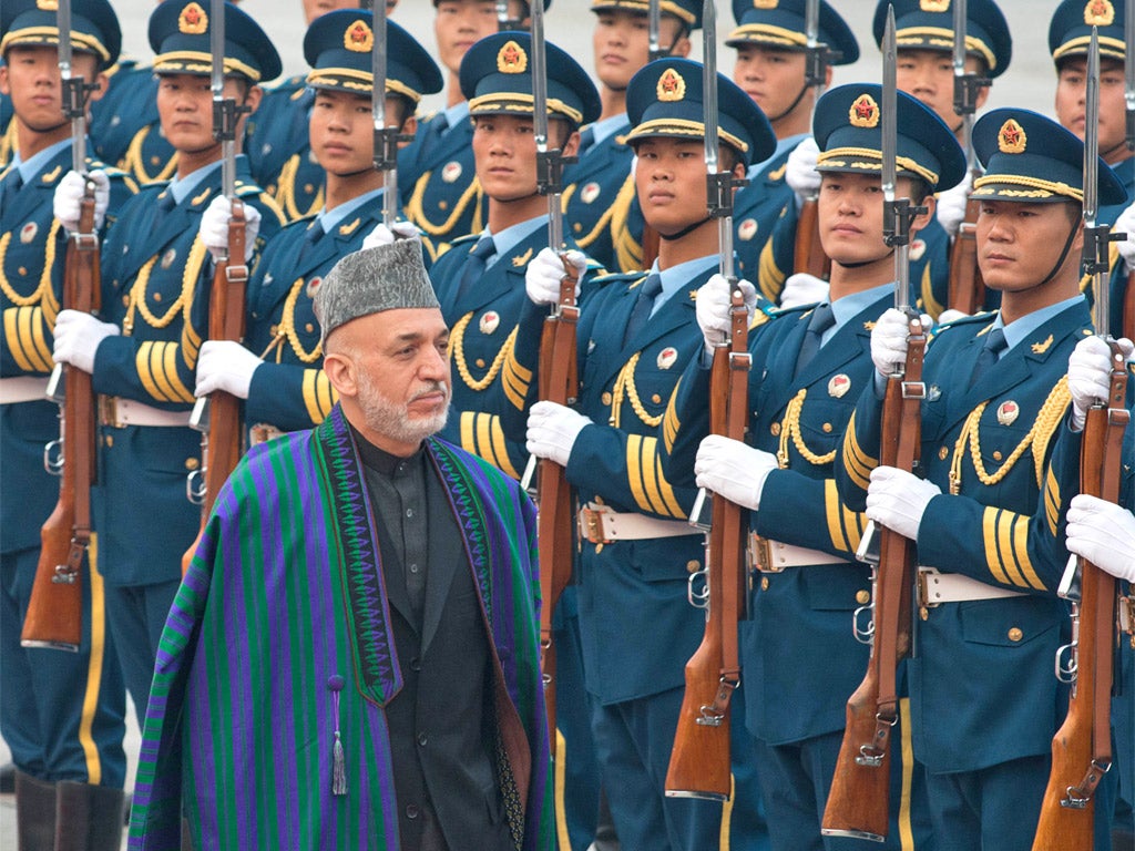 President Hamid Karzai in China last week (Getty)