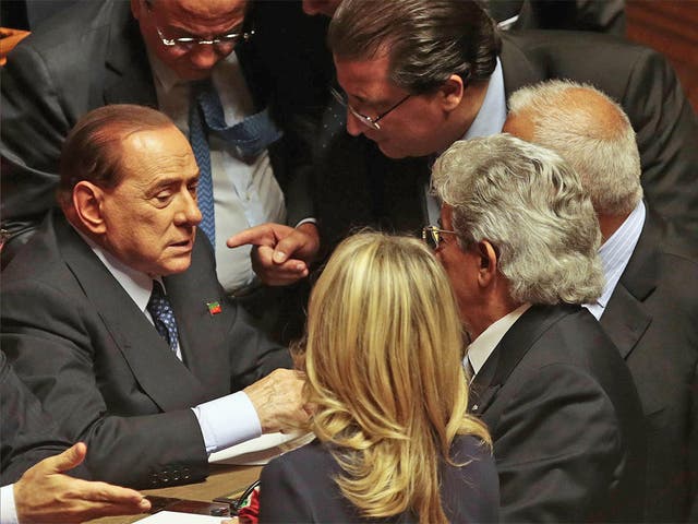 Silvio Berlusconi in feverish talks with senators in Italy’s Parliament at the confidence vote