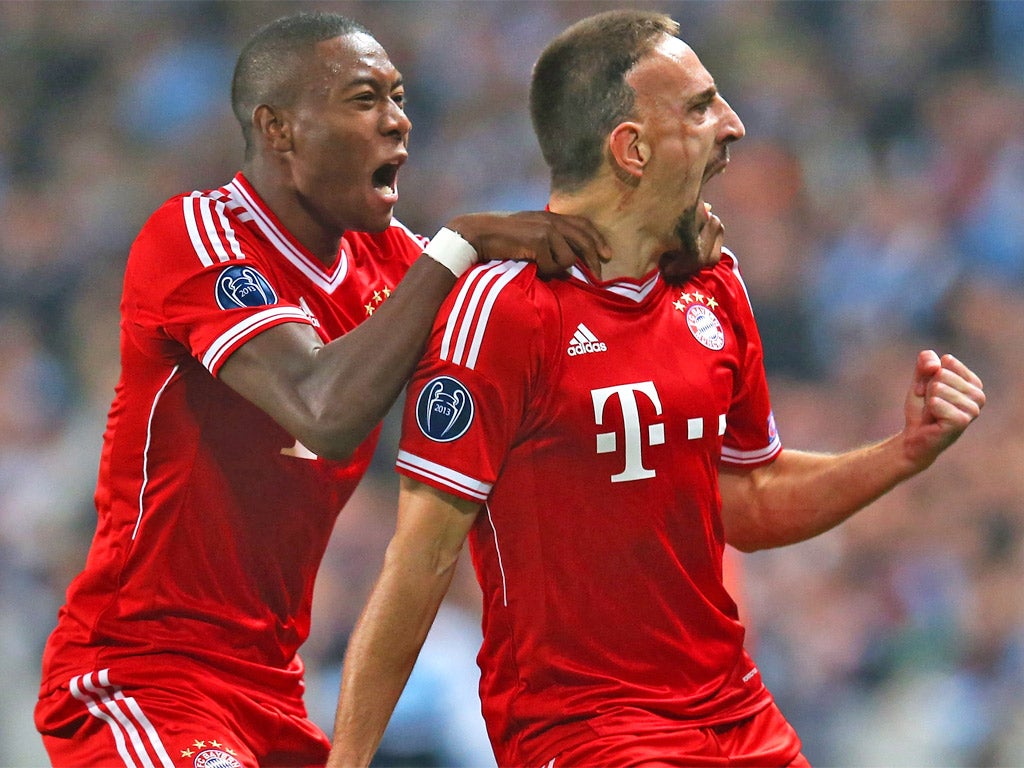 David Alaba celebrates with goalscorer Franck Ribery