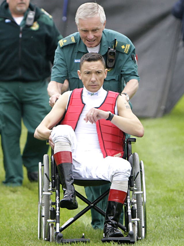 Frankie Dettori is helped to return to the medical room at Nottingham yesterday after a fall left him with a fractured ankle