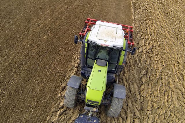 A man used a pocket knife to dig himself free after a tractor pinned him to the ground for more than six hours. 