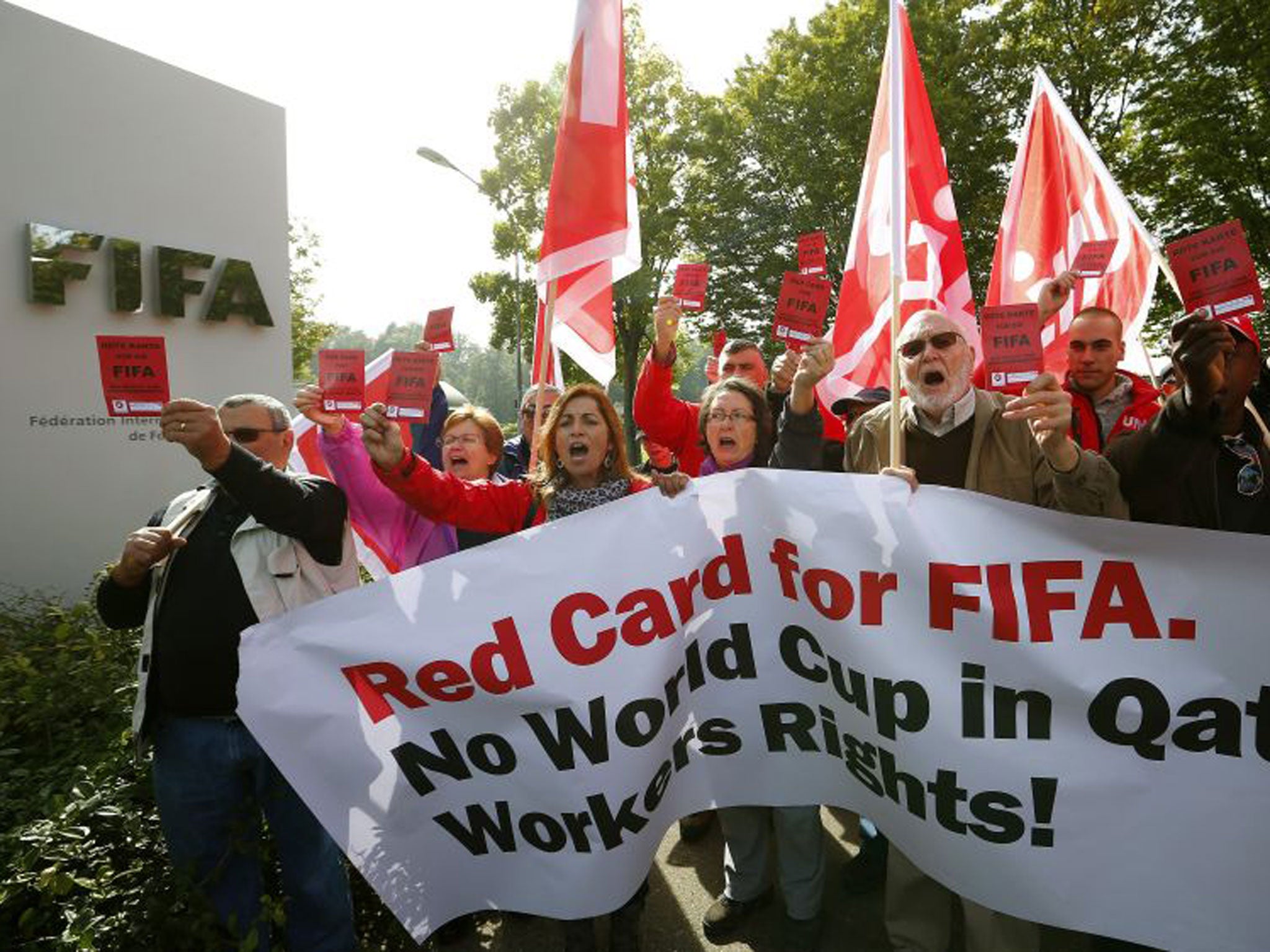 Members of Swiss workers' union Unia protest outside Fifa headquarters in Zurich.