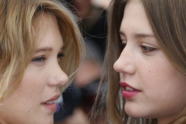 Lea Seydoux (left) and Adele Exarchopoulos at a photocall for the film "Blue is the Warmest Colour" 